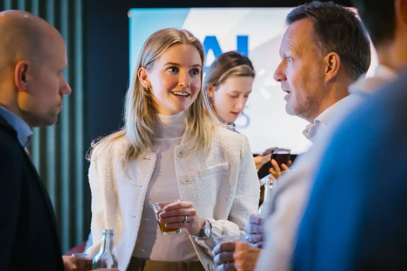 Guests in conversation during the event